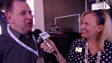 Christie's Manager, Marketing Programs, Douglas Grant with YBLTV Anchor, Erika Blackwell at the National Association of Broadcasters 2013