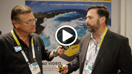 Paul Meyhoefer, Vice President of JK Imaging Ltd. demos the Kodak PIXPRO SP360 Action Cam to YBLTV Writer/Reporter, Erik Valainis at the 2015 International CES Show.