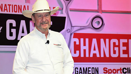 (l to r clockwise) Founder and CEO Gordon Logan opens Sport Clips Haircuts' recent National Huddle where company news and successes were shared, including the introduction of the franchises' first-ever Artistic Team. The Extreme Art of Jean Francois depicting Logan in his iconic cowboy hat, and NASCAR drivers Carl Edwards and Denny Hamlin, entertained the audience of more than 2,400 Sport Clips franchisees and their store managers, support team members, and partners. (PRNewsFoto/Sport Clips Haircuts)